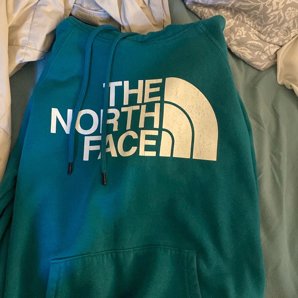 Teal women’s small north face hoodie